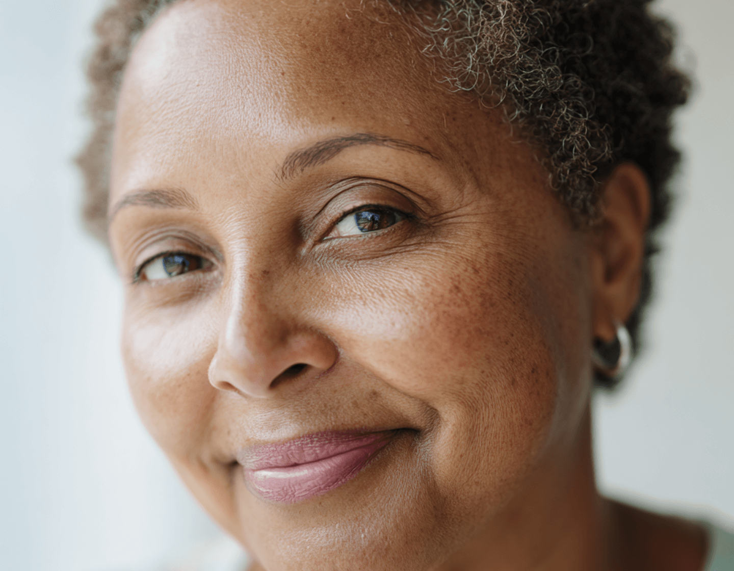 Woman with gray hair smiling