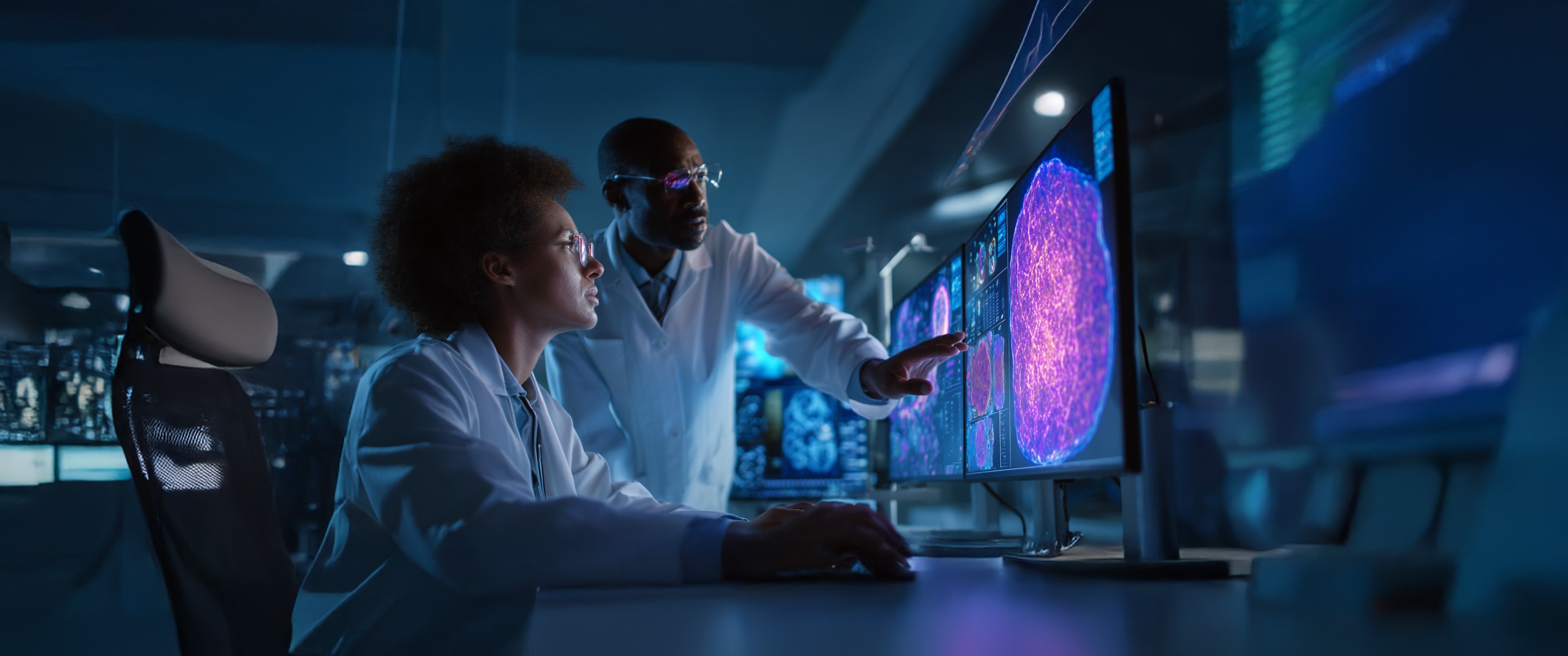Two doctors looking at a computer